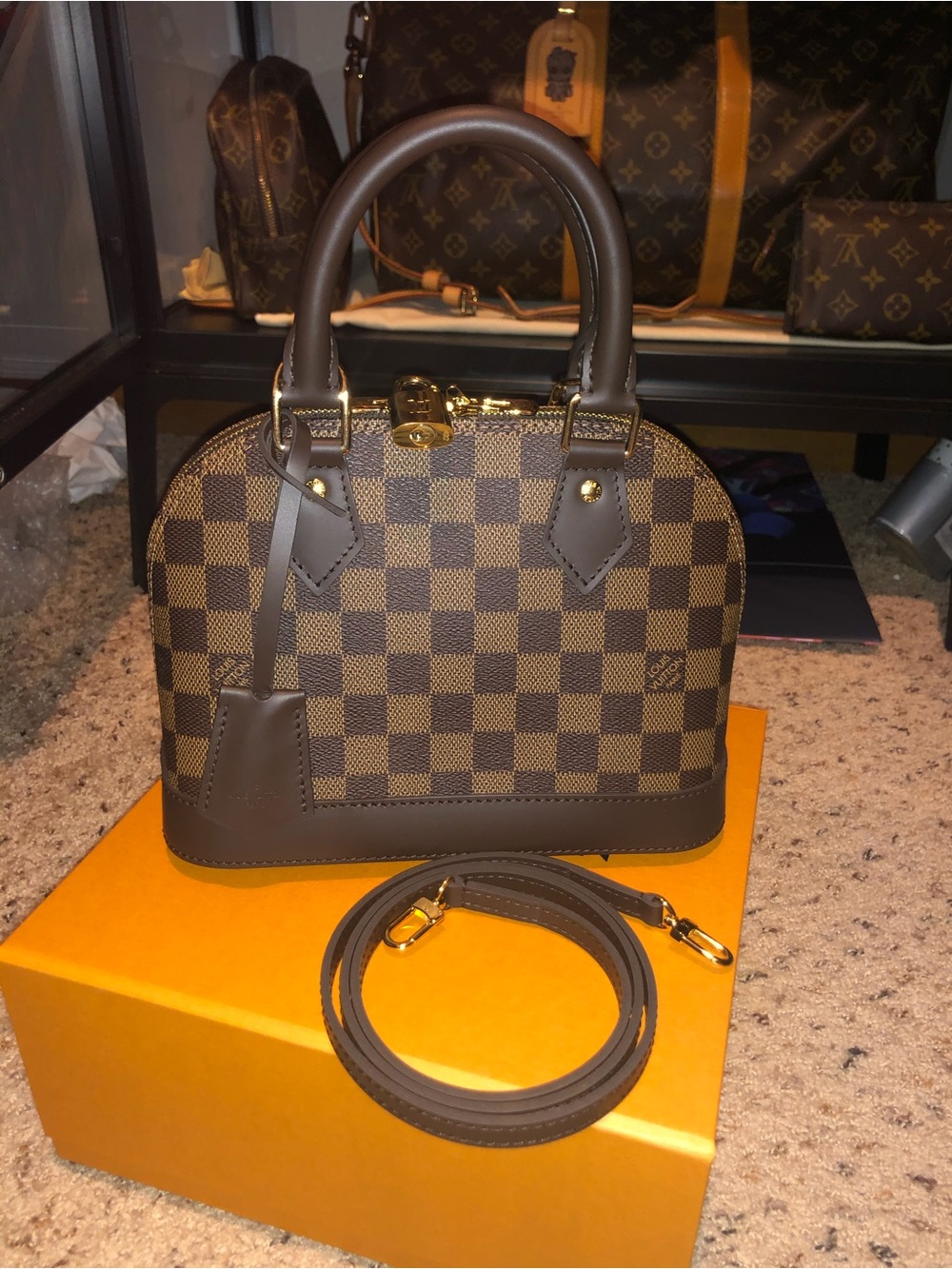 Louis Vuitton Damier Ebene Alma BB Mini Satchel in Brown